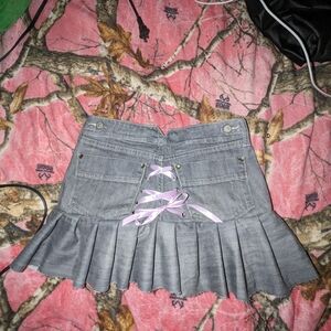 Lace up pleated mini skirt